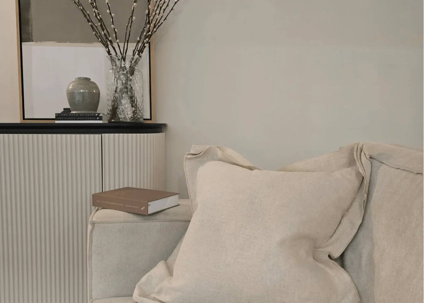 How to layer neutral cushions without looking flat