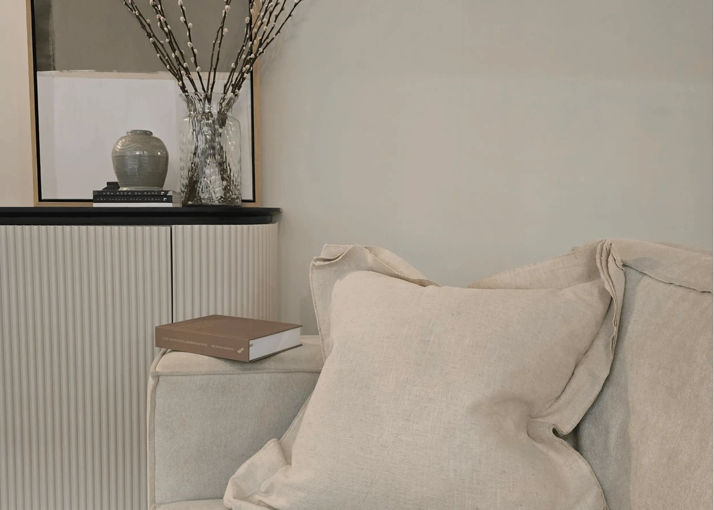 How to layer neutral cushions without looking flat