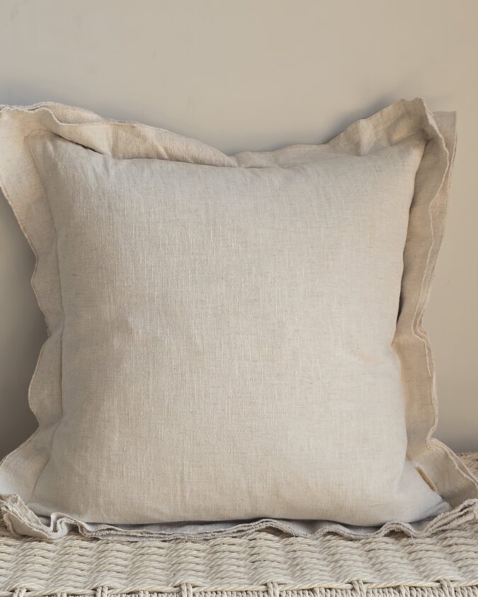 Stonewashed linen cushion with deep triple layered flanged edge in natural heavyweight linen