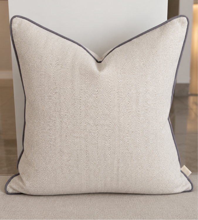 neutral herringbone cushion
